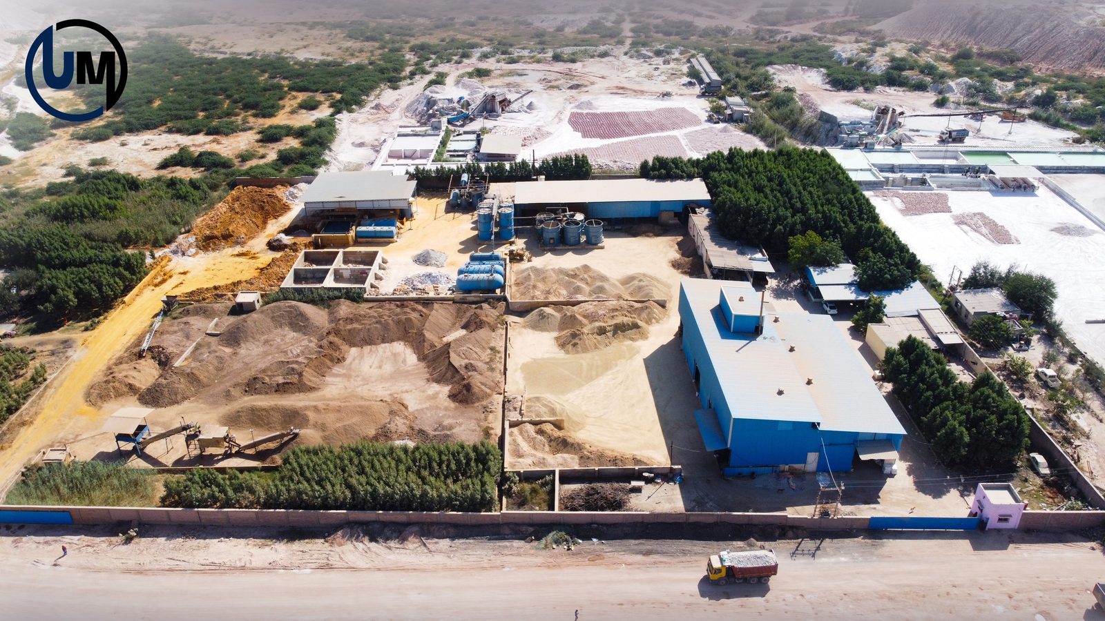 Aerial drone view of Umiya Minerals facility raw material yard